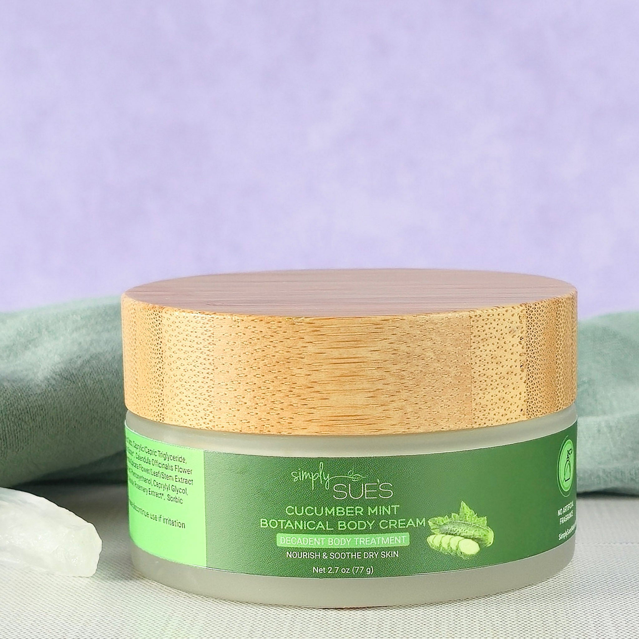 Cucumber mint body cream in glass jar with bamboo cap, natural moisturizing skincare