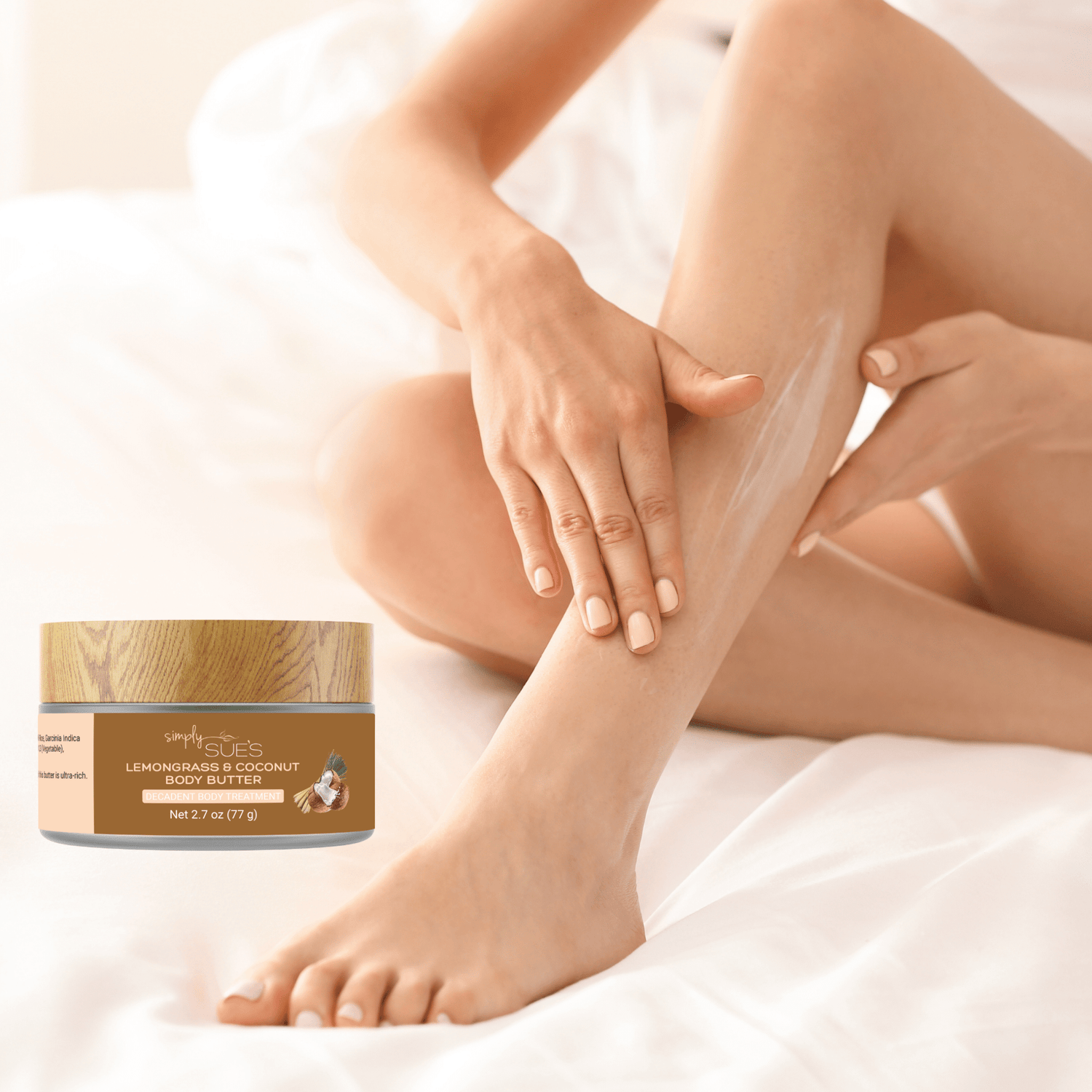 Woman applying Lemongrass & Coconut Body Butter for dry skin to her leg