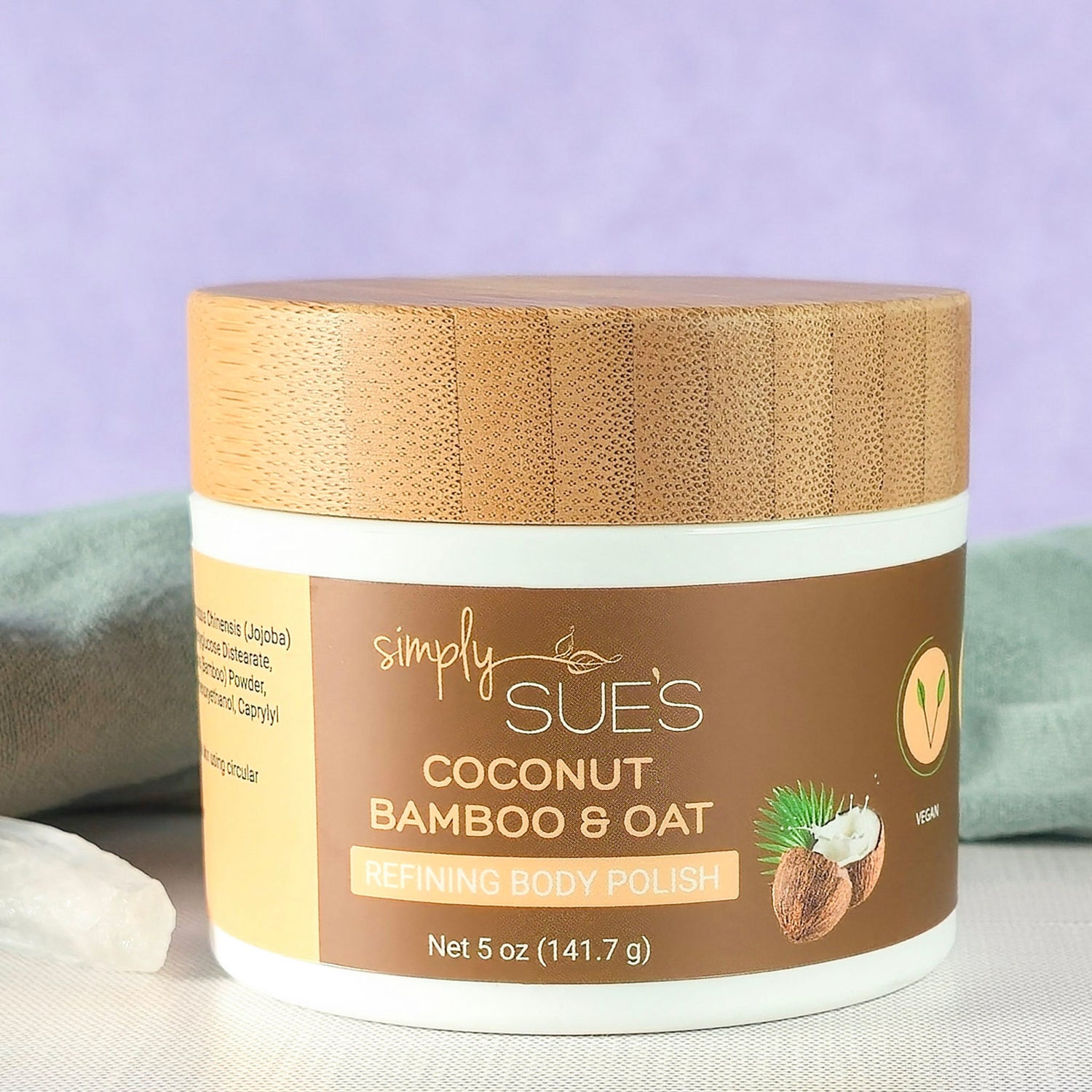 Lemongrass coconut body polish, exfoliating sugar scrub that smooths dry skin, in a white jar with bamboo lid