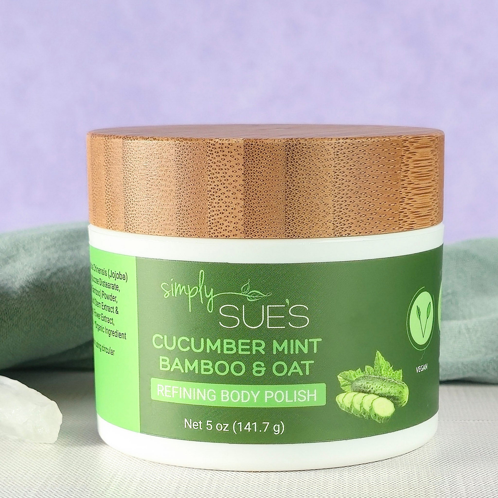 Lemongrass coconut body polish, exfoliating sugar scrub that smooths dry skin, in a white jar with bamboo lid