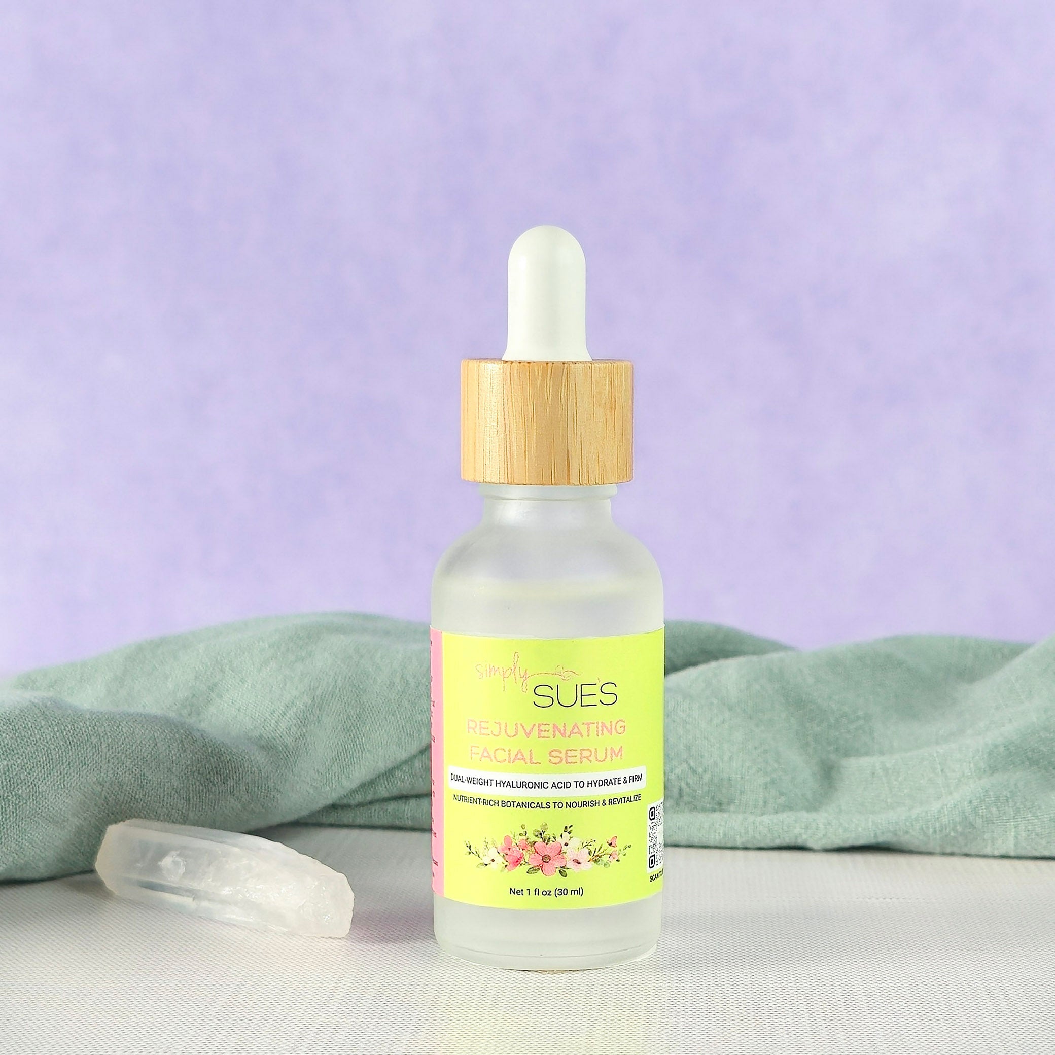 Natural facial serum in glass bottle with dropper on light purple background, lightweight hydrating serum that softens and supports skin