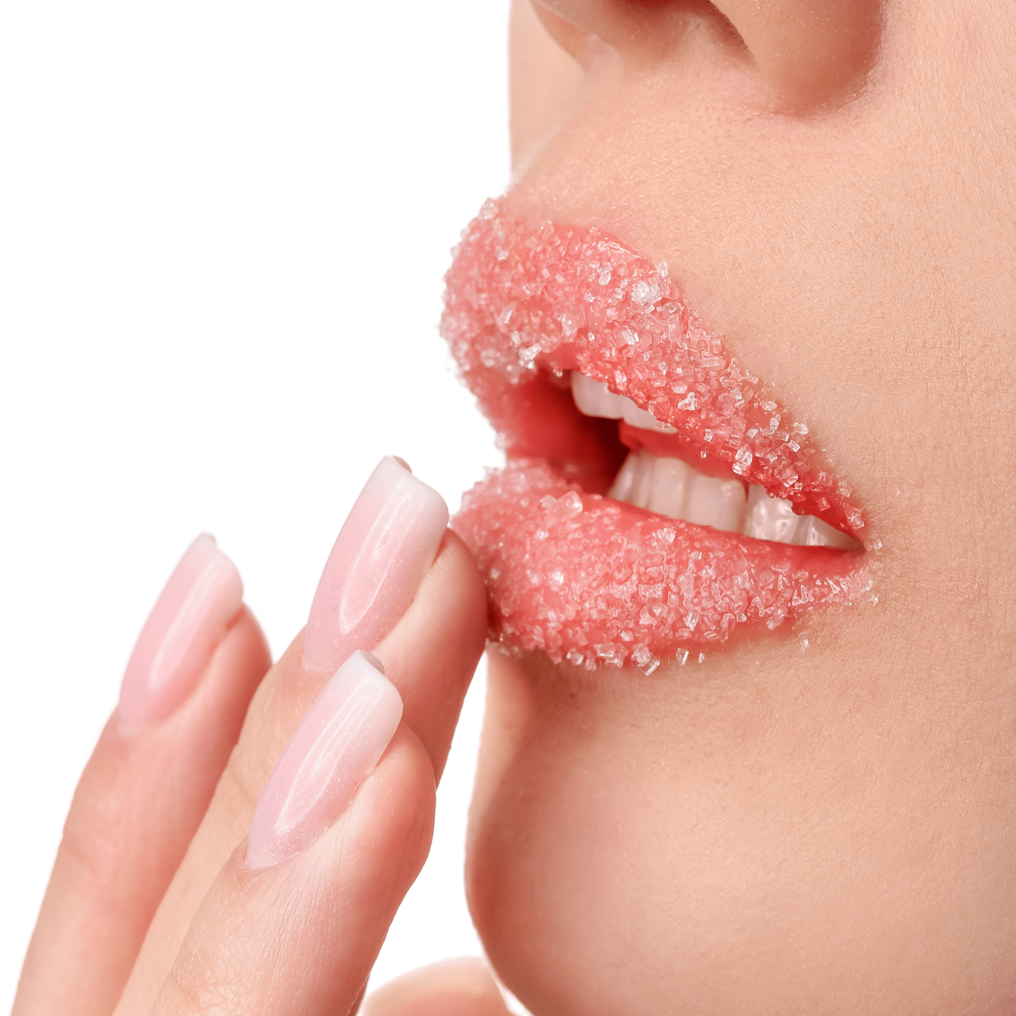 A woman applying our lip scrub to her lips to exfoliate